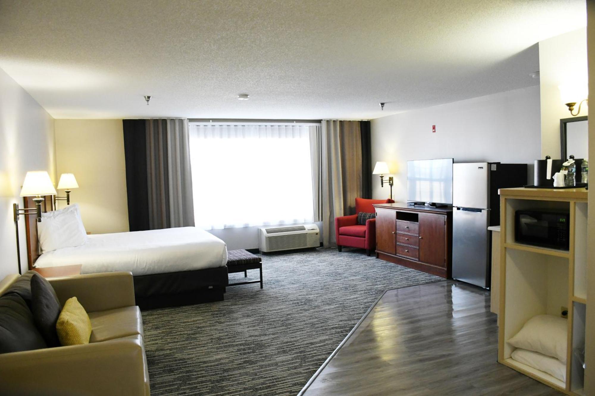 Harmony Inn & Suites ฟอร์ตดอดจ์ ภายนอก รูปภาพ